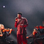 Claude performing C'est La Vie for Netherlands at the First Semi-Final in St. Jakobshalle